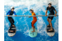 Thumbnail3 Kinder surfen die stehend Welle mit Haltestange in der Jochen Schweizer Arena