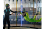 ThumbnailEin Junge zusammen mit einem Instruktor beim Indoor Skydiving im Windtunnel in der Jochen Schweizer Arena