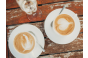 ThumbnailZwei Tassen Cappuccino und ein Glas Sekt